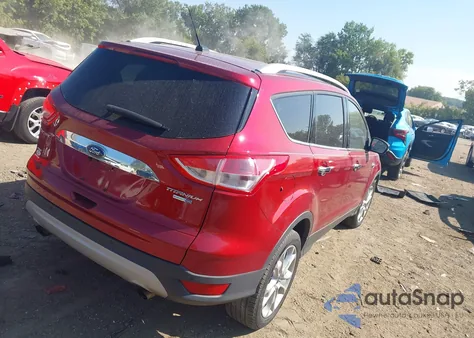 2015 Ford Escape Titanium z USA, uszkodzony, nr VIN 1FMCU9J96FUC67353
